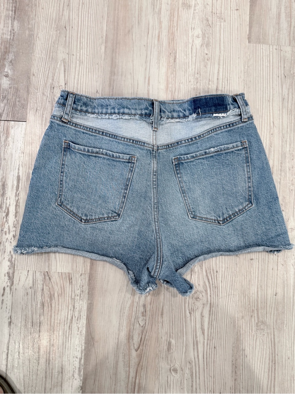 High-Rise Light Blue Denim Cutoff Shorts